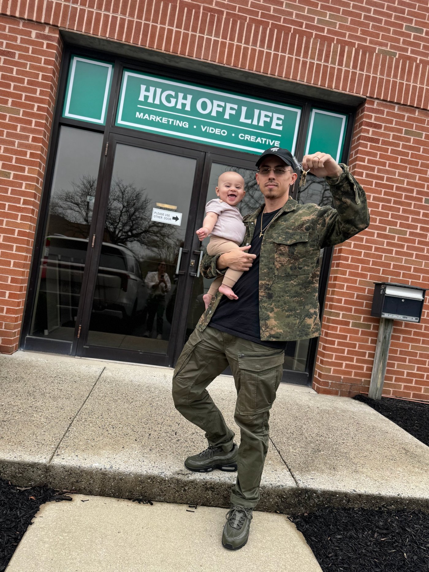 Z. Rich outside the High Off Life studio on opening day